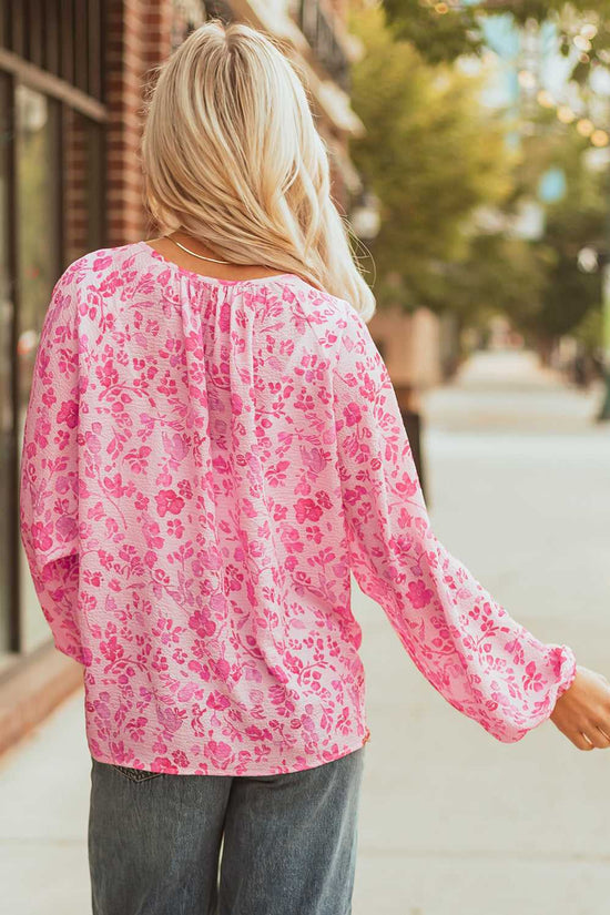 Back view of Pink Floral Lightweight Blouse worn by model, showing relaxed fit and floral design.