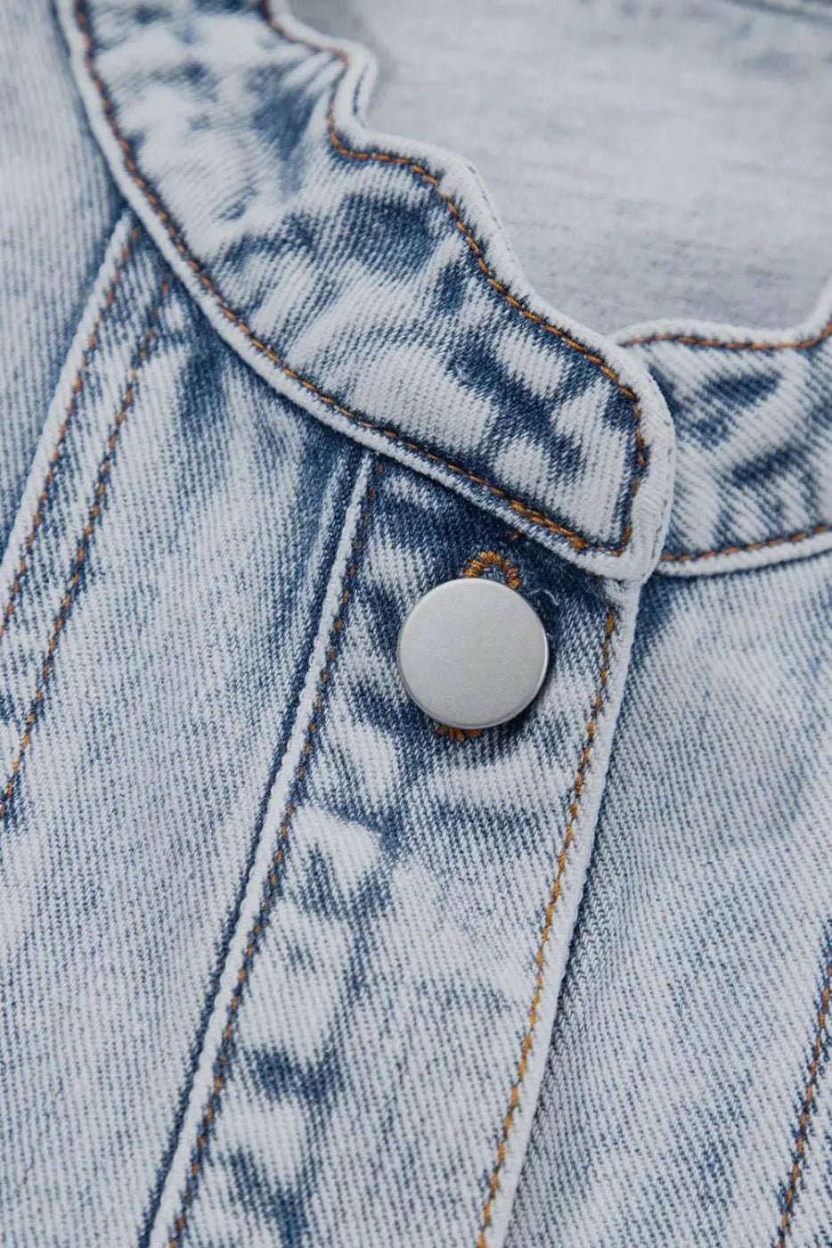 Macro view of snap button and scallop trim on Beau Blue Denim Waistcoat, highlighting texture and craftsmanship in casual vests.