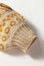 Cuffed sleeve detail of Women's Khaki Western Pattern Knit Cardigan with mustard and brown knit accents. Durable ribbed finish.