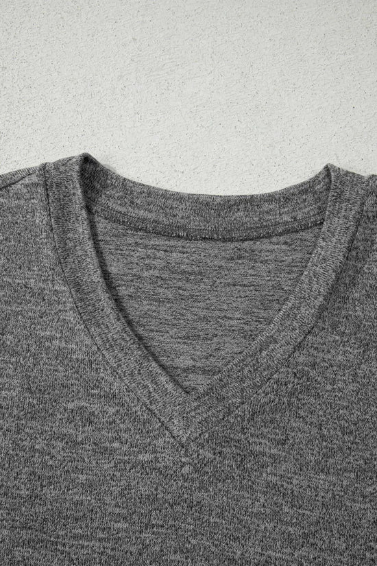 Detail of V-neck top from Heather Mauve Duster Lounge Trio – 3‑Piece Loungewear Set in grey, showcasing neckline stitching and soft fabric.