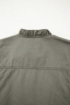 Back neckline detail of Green Bay Ruffled Denim Vest - Women's Fashion Trends with subtle ruffle trim and structured stitching.
