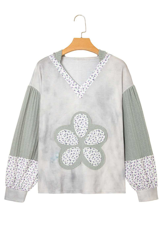 Floral Applique Oversize Hoodie in pear-green waffle knit with V-neck, patchwork sleeves, and large flower applique on front for fall casual wear.