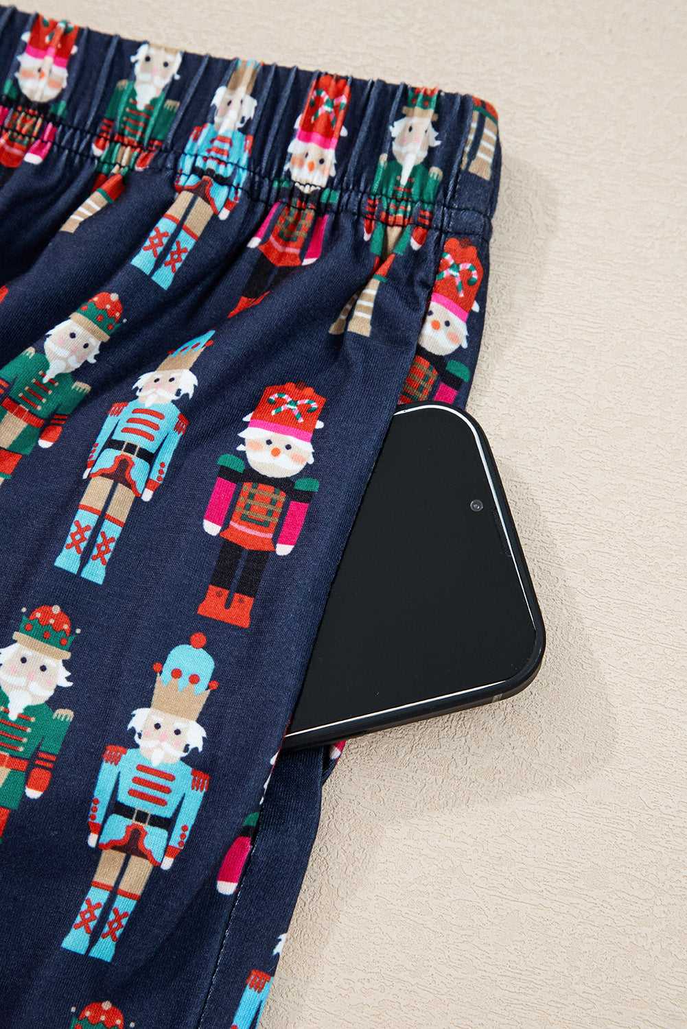 Close-up of the nutcracker print shorts from the Ladies Nutcracker Christmas Lounge Set by FashionFitz UK, featuring an elastic waistband and side pocket.