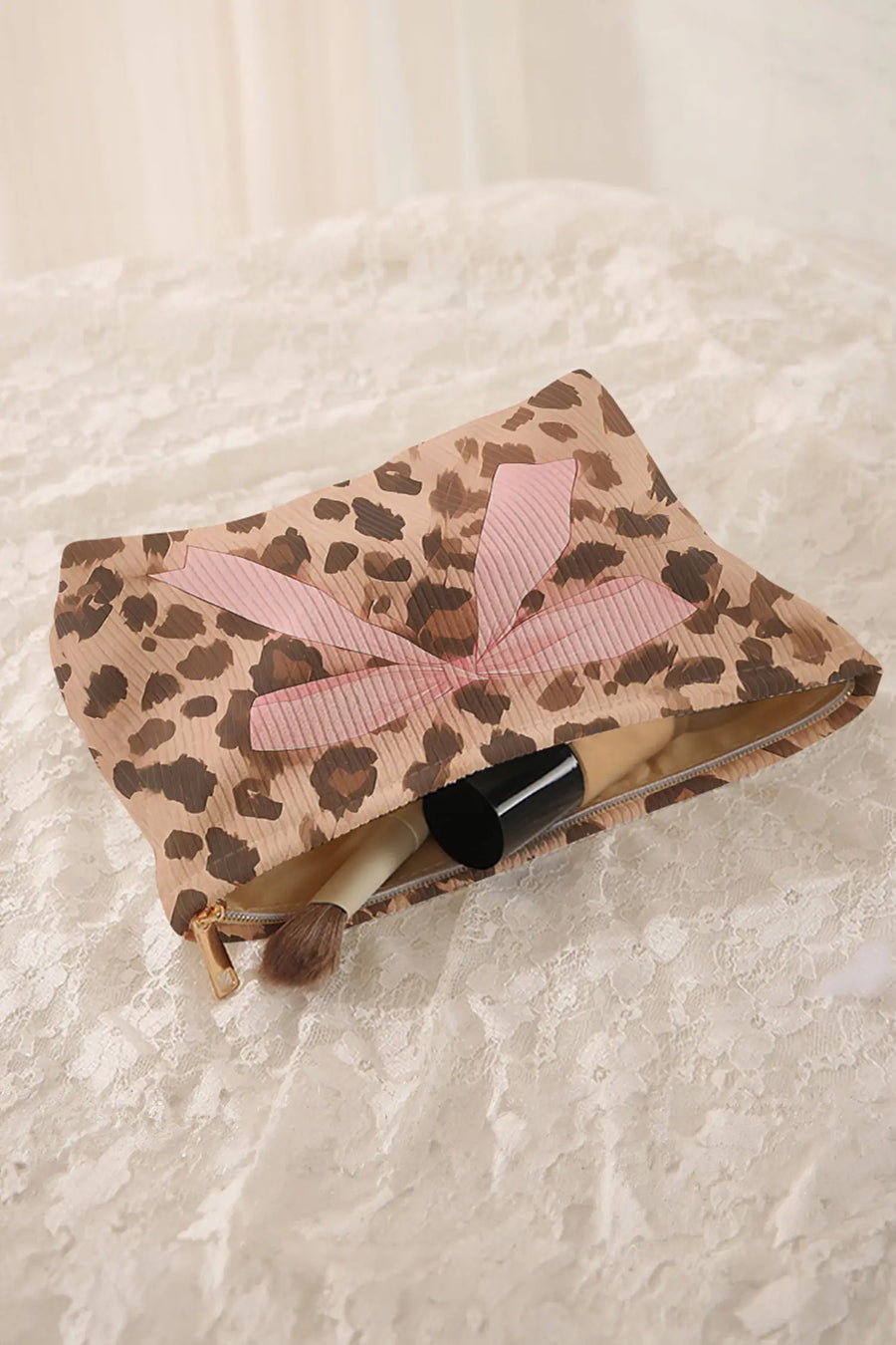 Women's leopard bow makeup bag detail view bow clasp