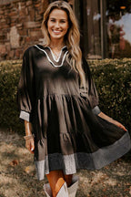 FashionFitz® black Stitch Detail Tiered V‑Neck Babydoll Dress with 3/4 sleeves and A-line cut, ideal for daily wear in fall season.