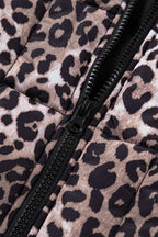 Close-up of black zipper on Leopard Print Quilted Puffer Gilet. Durable front fastening enhances this stylish women’s vest.