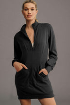 Chic black zip-up sweatshirt dress for women with a deep V-neck and cozy fit, blending comfort and style effortlessly.