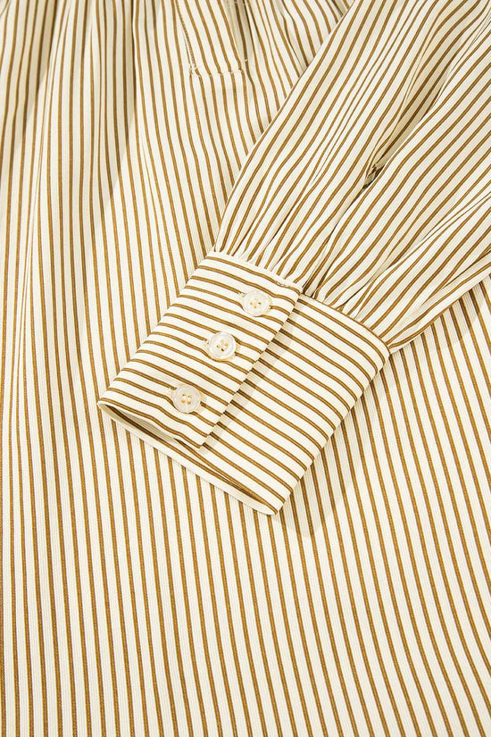 Detail of Brown Stripe Mini Dress sleeve with buttoned cuff. Fine stripe print and tailored finish enhance its casual elegance.