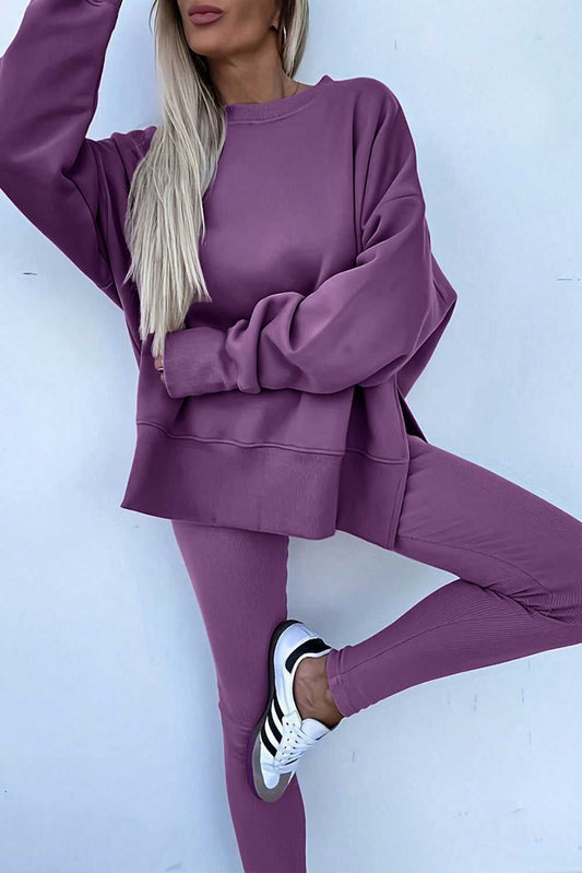 Women's Oversized Sweatshirt and Leggings Matching Set in purple, featuring a relaxed fit top and ribbed leggings for casual fall loungewear.