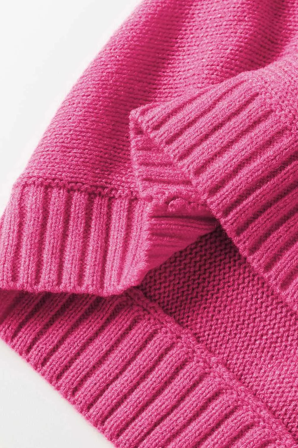 Detailed view of ribbed hem and sleeve cuff on the Stylish High Neck Red Sweater - Christmas, made from 100% acrylic for winter comfort.