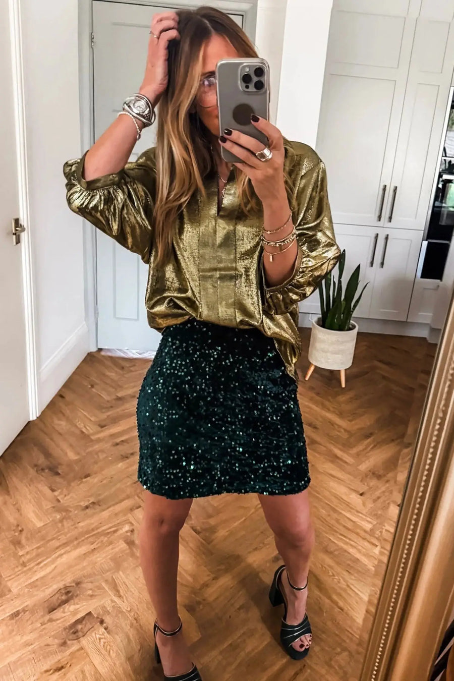 Back view of gold metallic half sleeve blouse showing drape and metallic fabric finish Fashionfitz UK