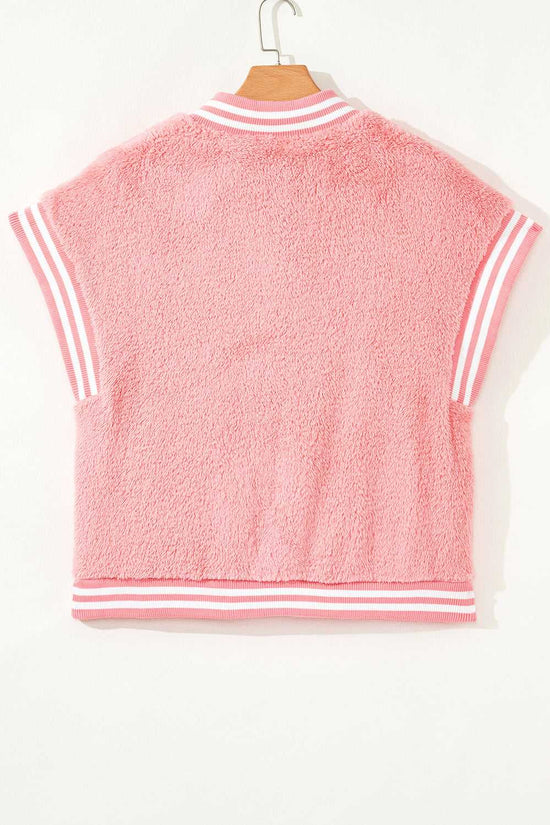 Pink fleece vest for cosy layering