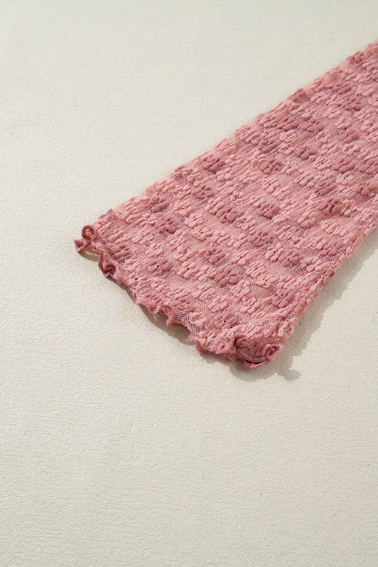 Bell sleeve detail of pink floral lace blouse with scalloped edge. Lightweight lace ideal for spring and Valentine's Day outfits.