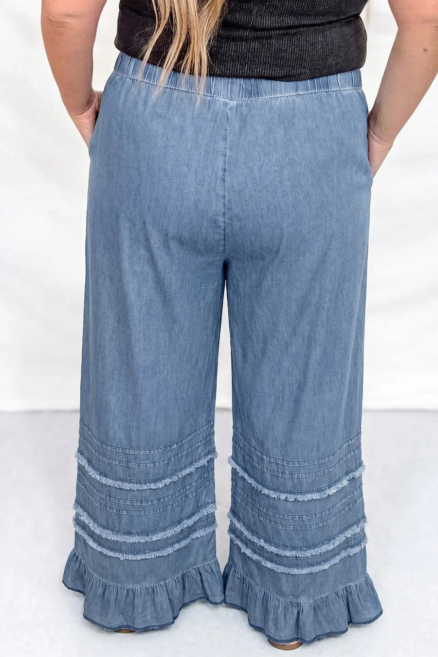 Plus size tiered ruffled wide leg denim pants back view — Fashionfitz UK