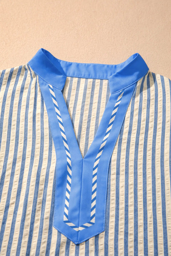 Stripe colour block blouse worn loose over wide-leg jeans | Fashionfitz UK