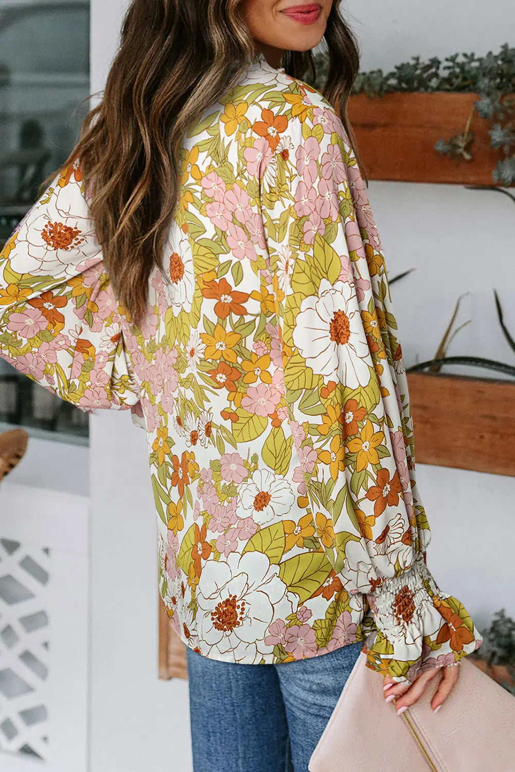 Casual cakewalk floral smocked blouse with ruffles