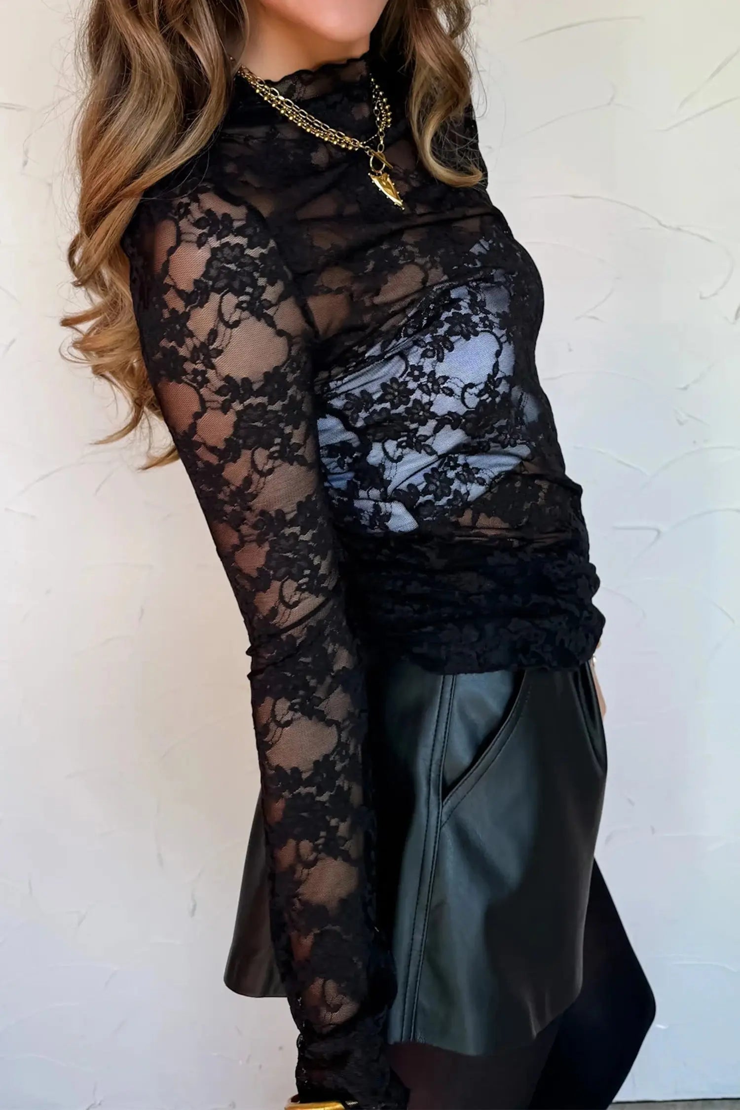 Black sheer floral lace lettuce trim mock neck long sleeve top