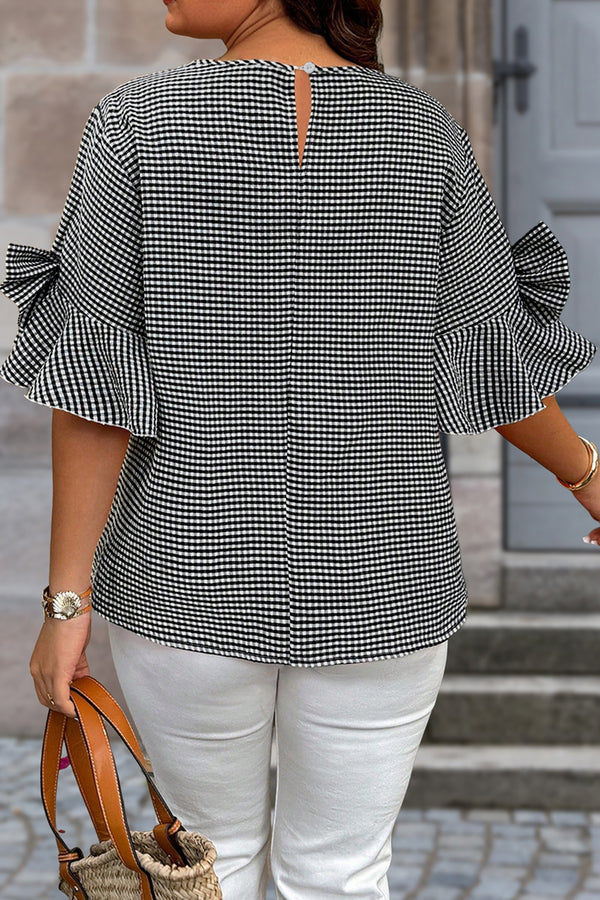 Black bell sleeve plus size jumper — side view showing plaid knit and bow detail