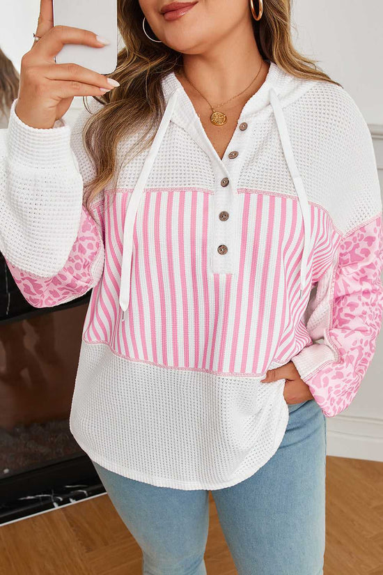 Selfie angle of Curve Pink Leopard Stripe Waffle Hoodie for Women showcasing waffle knit texture and stylish pink stripe and leopard print details.