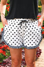Women's polka dot ruffle trim contrast shorts front view casual