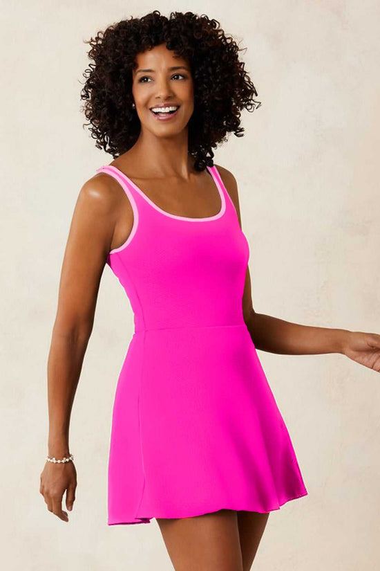 Front view of pink modest swim dress with shorts, high-waist fit and wire-free padded bust. Perfect for summer poolside fashion.