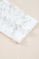 Detailed view of the white lace sleeve on the Lace Sleeve Drop T-Shirt - Soft & Comfy | FashionFitz, showcasing its floral lace pattern.