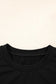 Close-up of the neckline on the Lace Sleeve Drop T-Shirt - Soft & Comfy | FashionFitz, showing the smooth black fabric and round collar.
