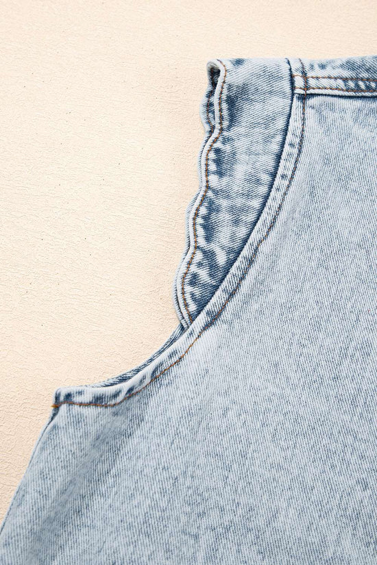 Detail of scalloped armhole trim on Beau Blue Denim Waistcoat, showcasing high-quality stitching and soft denim fabric.