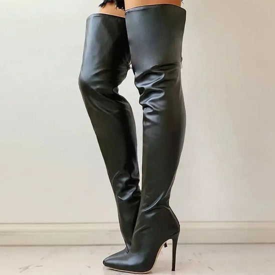 Black stretch over knee boots with high stiletto heel and sleek silhouette. Women’s fashion boots for bold and modern styling.