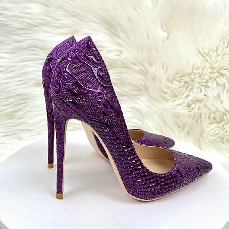 Purple embossed stiletto pumps
