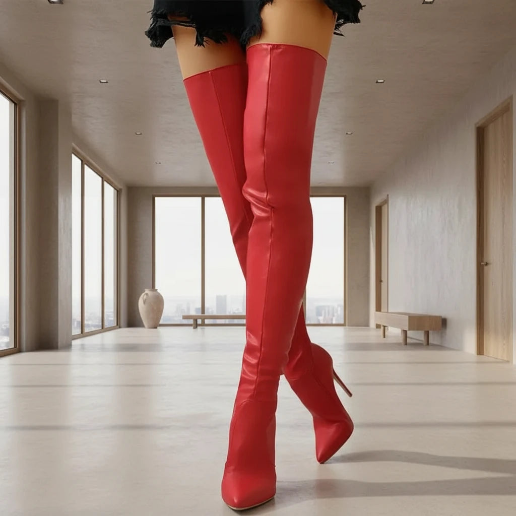 Red over knee stretch boots for women with 11cm high heel and pointed toe. Fashion-forward footwear for bold statement looks.