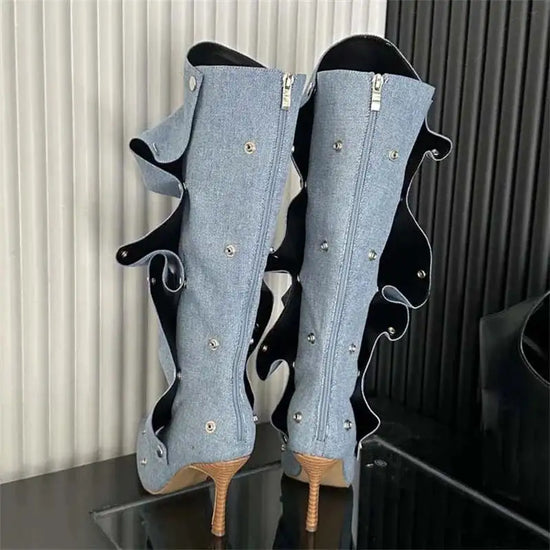 Back view of Women's Denim Boots with zippers, thin heels, and pleated design, showcasing silver button embellishments.