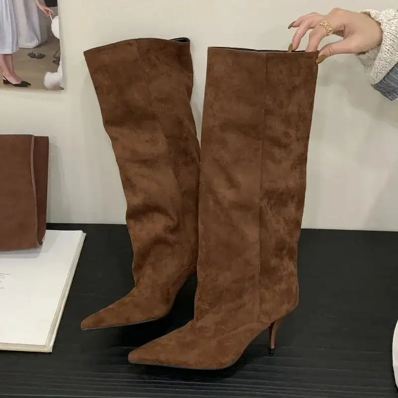 Elegant brown faux suede knee-high boots with pointed toe and kitten heel, great for stylish everyday wear.