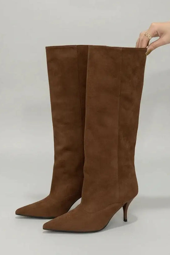 Classic brown retro suede knee-high boots for women with a slim kitten heel and pointed toe for a refined look.