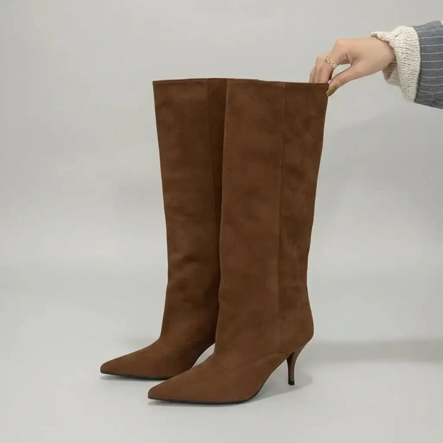 Classic brown retro suede knee-high boots for women with a slim kitten heel and pointed toe for a refined look.