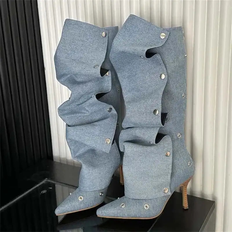 Stylish Women's Denim Boots with knee-high pleated design and pointed toes, featuring thin heels and silver button details.