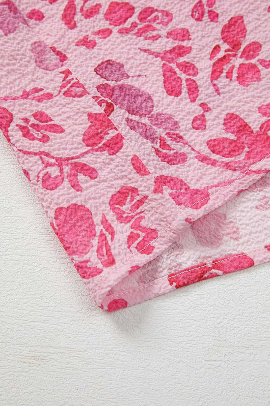 Elastic sleeve cuff on Pink Floral Lightweight Blouse, highlighting the floral print and gathered design.