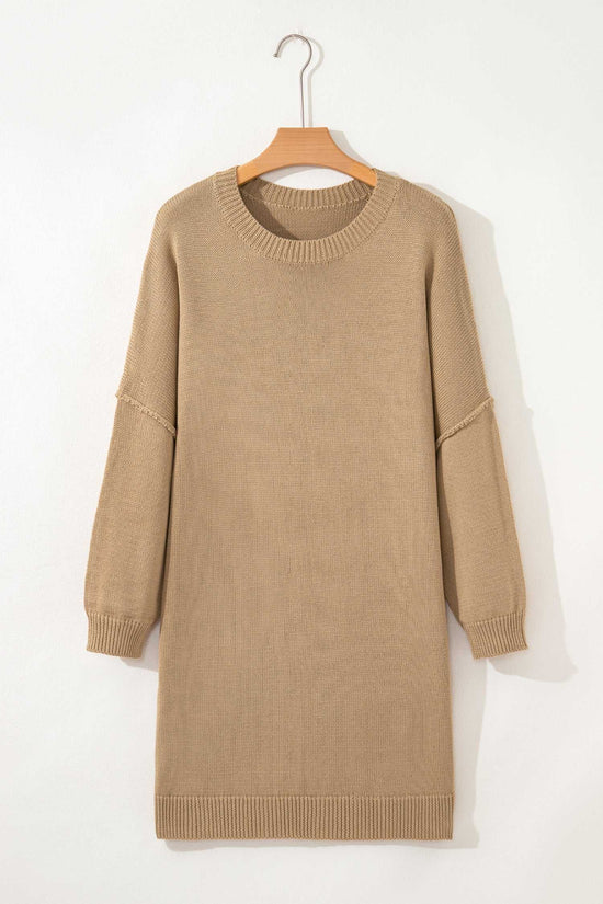 Khaki Oversized Jumper Dress on a hanger against a white background