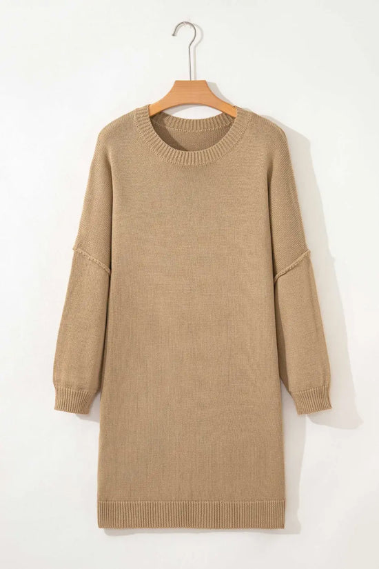 Khaki Oversized Jumper Dress on a hanger against a white background