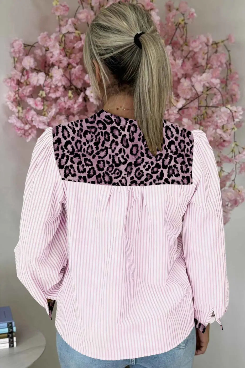 Back view of pink Leopard Pinstripe Contrast Shirt showing leopard print yoke and vertical pink stripes, ideal for spring office wear.