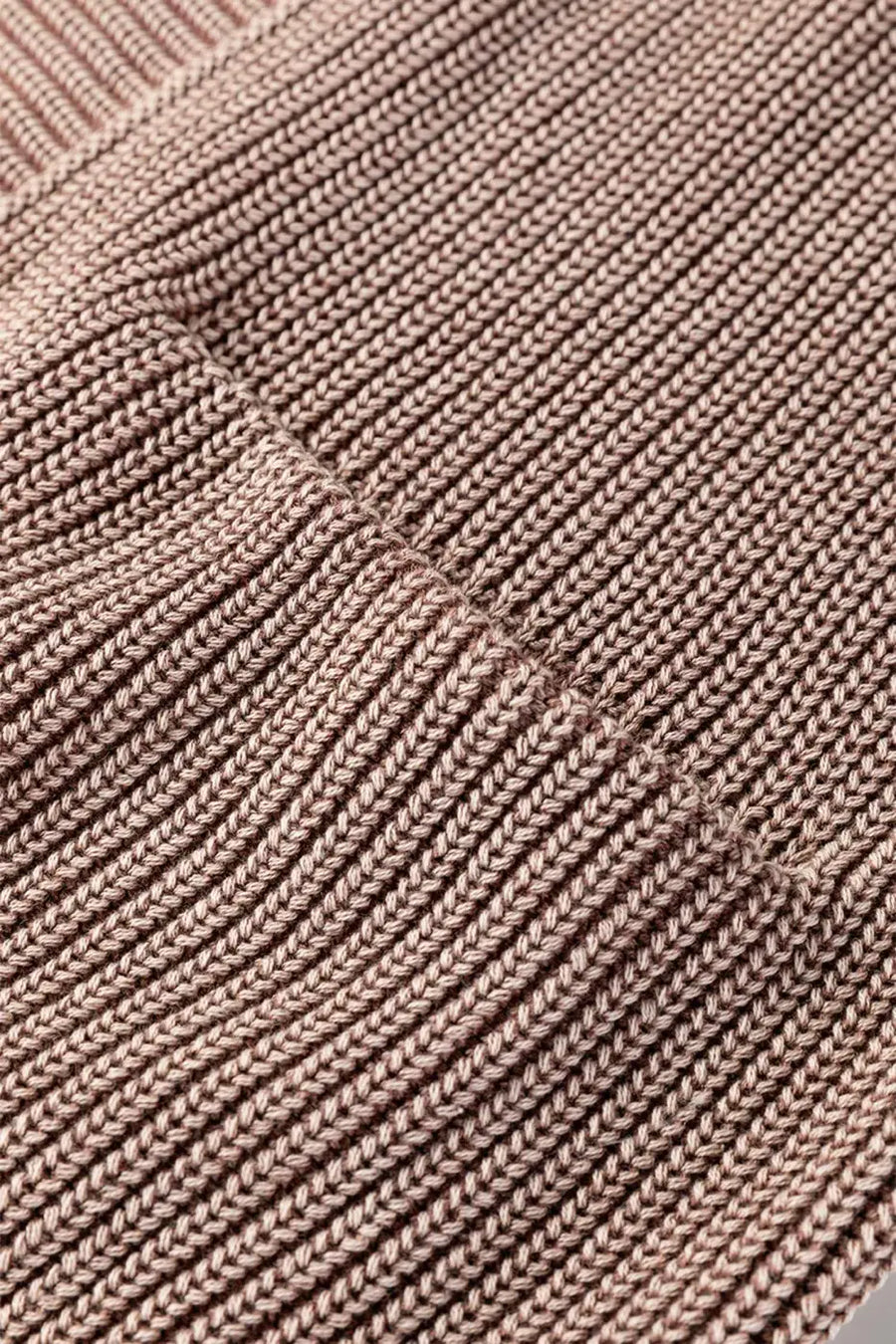 Close-up of brown ribbed knit texture on Women's Stonewash Patchwork Knit Open Cardigan, showcasing detailed stitching and soft fabric.
