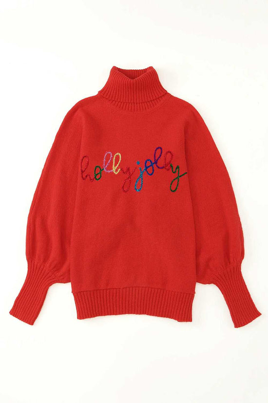 Flat lay of red high neck sweater with 'holly jolly' embroidery, perfect for Christmas and winter wardrobe styling.