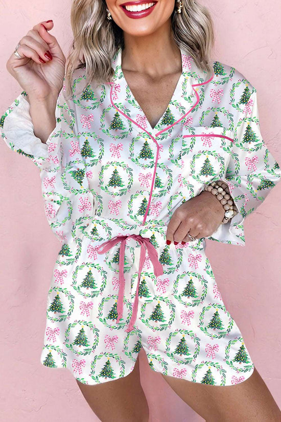 Ladies White Christmas Print Velvet Trim Pyjamas with pink bows and green wreaths, featuring pink velvet drawstring and piping detail.