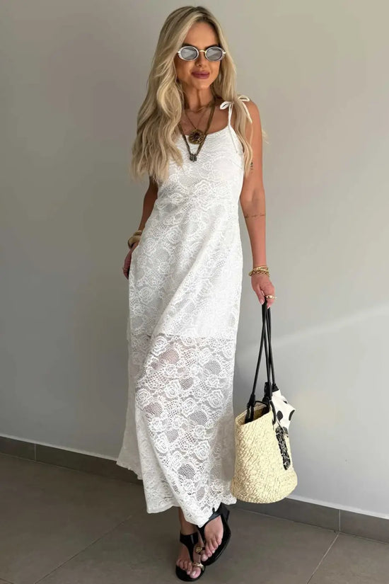 Elegant White Lace Overlay Spaghetti Strap Maxi Dress featuring floral lace and A-line silhouette, ideal for summer holidays and events.