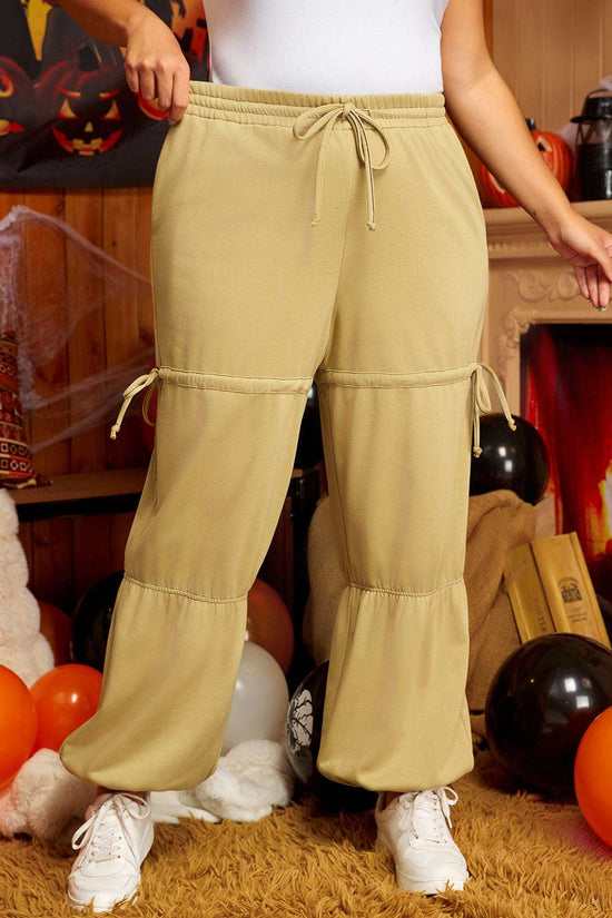 Front view of beige plus size Terry Knit Drawstring Sweatpants with adjustable ties and elastic waistband, perfect for cozy spring outfits.