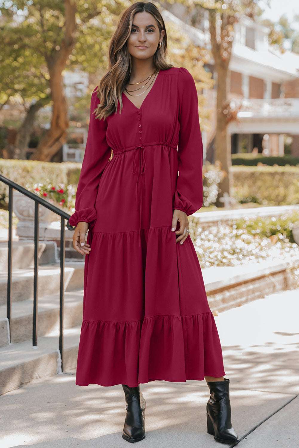 Ladies Burgundy Long Sleeve Tiered Maxi Dress with V-neckline and drawstring waist, perfect for modern fall wardrobe styling.