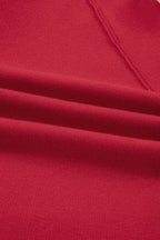 Close-up of the soft red fabric texture of the Women's Wrap Cardigan Jacket, highlighting its quality knit material.