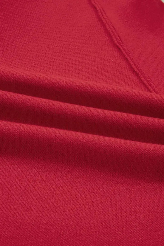 Close-up of the soft red fabric texture of the Women's Wrap Cardigan Jacket, highlighting its quality knit material.