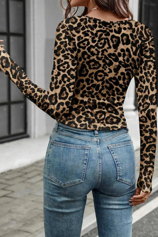 Back view of leopard print slim long sleeve top showing full animal print design and snug fit for stylish layering.