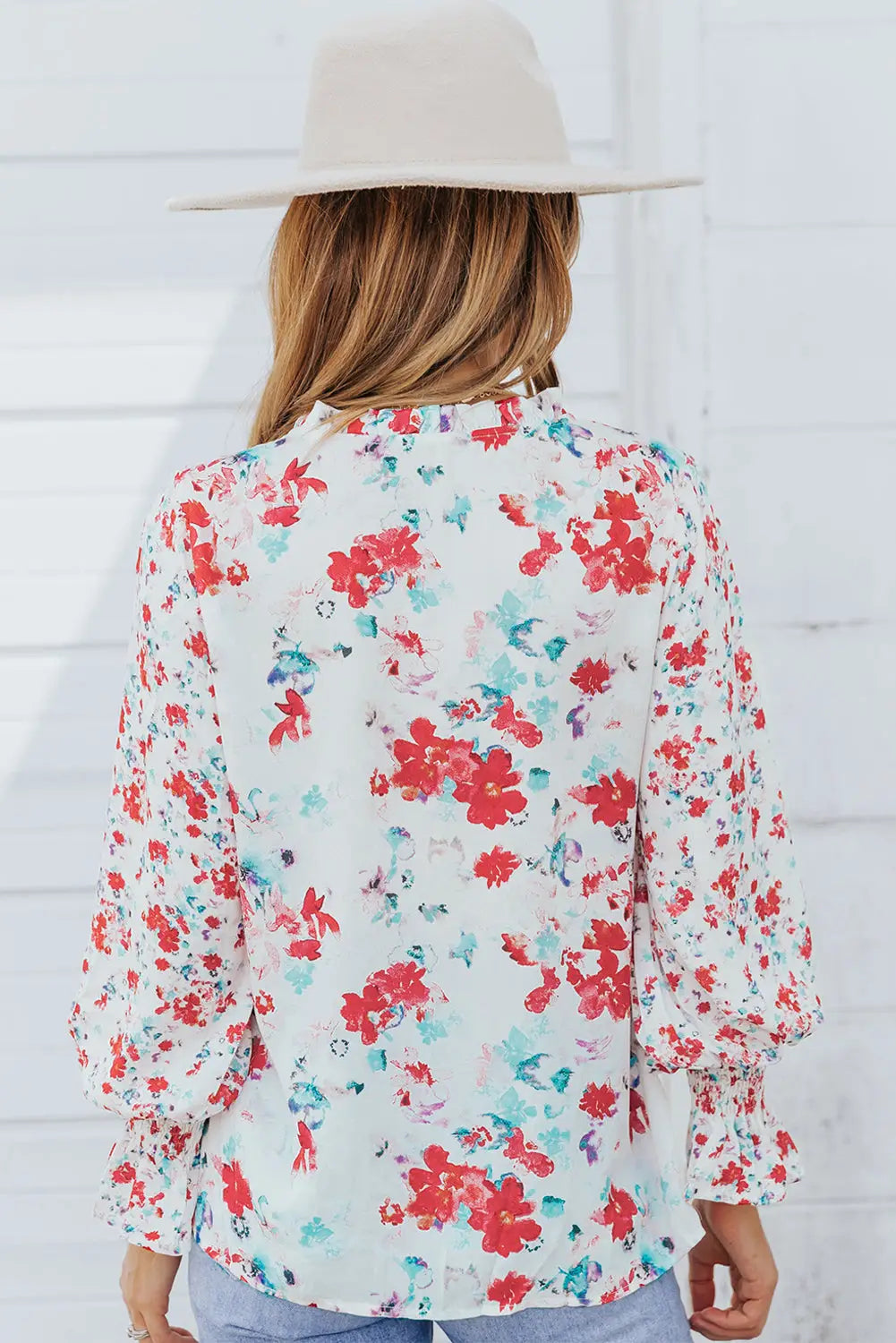 Casual cakewalk floral smocked blouse with ruffles